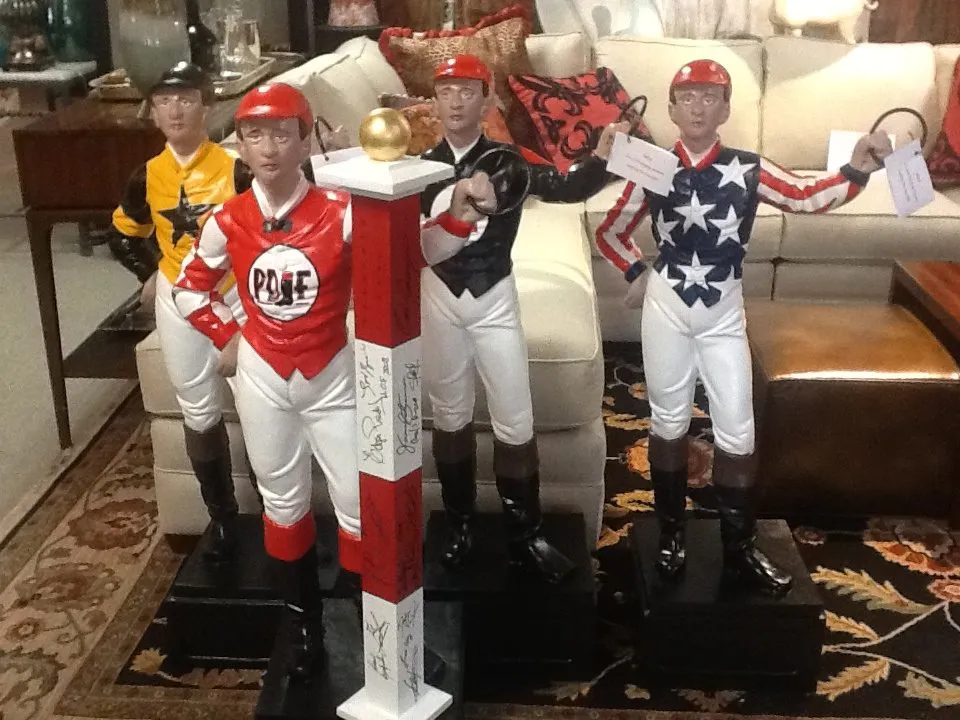 A lawn jockey statue hand painted by Saratoga Signature Interiors